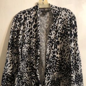 Susan Lawrence black and white sweater cardigan with longer tail in front. LS